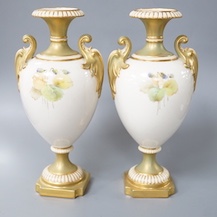 A pair of Royal Worcester flower painted vases, signed Cole 17cm